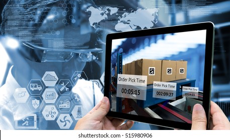 Industry 4.0,Augmented reality and smart logistic concept. Hand holding tablet with AR application for check order pick time in smart factory warehouse.Man use AR glasses and infographic background. - Shutterstock ID 515980906