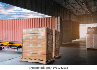 Industry Cargo Freight Trucks Transport and Logistics. Trailer Container Truck Parked Loading Package Boxes at the Warehouse. Supply Chain. Distribution Warehouse Center. Shipping Shipment Cargo. - Shutterstock ID 1911242533