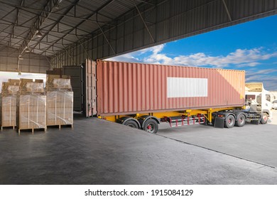 Industry Cargo Freight Trucks Transport and Logistics. Trailer Container Truck Parked Loading Package Boxes at the Warehouse. Supply Chain. Distribution Warehouse Center. Shipping Shipment Cargo.