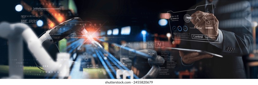 Industry engineer in factory using digital tablet with automated robot arm machine learning operation, system control monitoring, business and smart industry 4.0 technology, AI Artificial intelligence