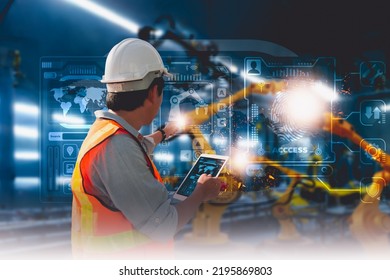 Industry Engineer In Factory,using Smart Tablet Device,control Automated Robot Arm Machine Learning Operation,concept Business And Industry 4.0,Artificial Intelligence Or AI,with 5G Network