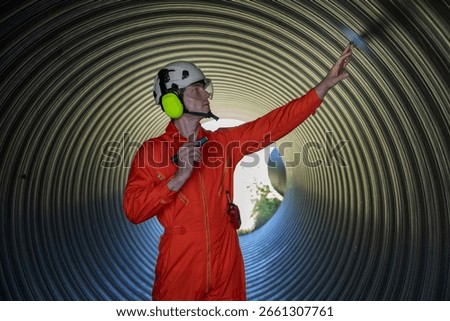 Industry Engineers Walking Inside Circular water Pipe. Engineering or Worker inspection pipe circular. Checking Construction of the water, Oil Natural Gas and fuels Transport Pipeline.