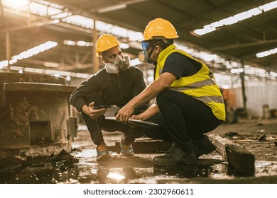 Industry environment impact inspector team work investigate danger chemical oil gas leak with safety face mask - Shutterstock ID 2302960611