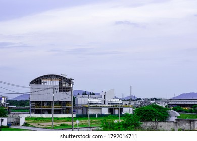 Industry Factory Buidling With Modern Warehouse In Blue Sky Clouds Background. Environmentally Friendly Manufacturing Plant Of New Technology Production Line