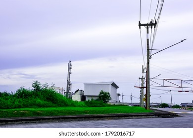 Industry Factory Buidling With Modern Warehouse In Blue Sky Clouds Background. Environmentally Friendly Manufacturing Plant Of New Technology Production Line