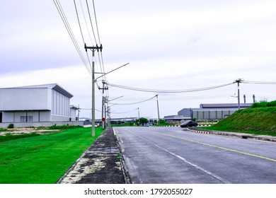 Industry Factory Buidling With Modern Warehouse In Blue Sky Clouds Background. Environmentally Friendly Manufacturing Plant Of New Technology Production Line