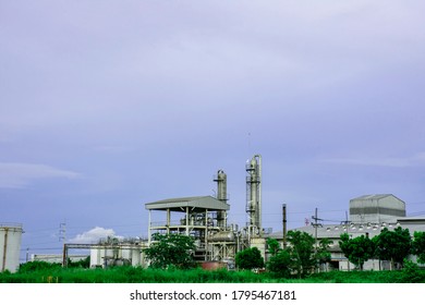 Industry Factory Buidling With Modern Warehouse In Blue Sky Clouds Background. Environmentally Friendly Manufacturing Plant Of New Technology Production Line