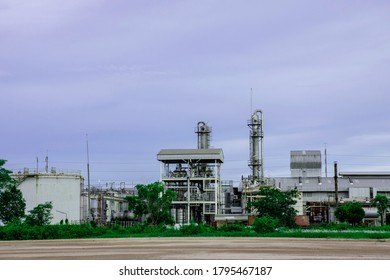 Industry Factory Buidling With Modern Warehouse In Blue Sky Clouds Background. Environmentally Friendly Manufacturing Plant Of New Technology Production Line