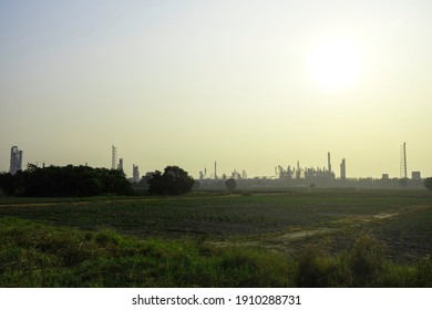 Industry Factory Buidling With Modern Warehouse In Morning Sunrise Sky Background. Environmentally Friendly Manufacturing Plant Of New Technology Production Line