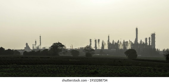 Industry Factory Buidling With Modern Warehouse In Morning Sunrise Sky Background. Environmentally Friendly Manufacturing Plant Of New Technology Production Line