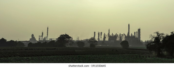 Industry Factory Buidling With Modern Warehouse In Morning Sunrise Sky Background. Environmentally Friendly Manufacturing Plant Of New Technology Production Line