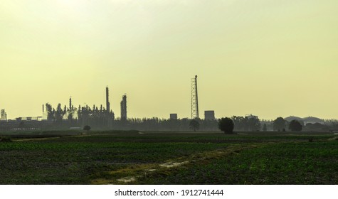 Industry Factory Buidling With Modern Warehouse In Morning Sunrise Sky Background. Environmentally Friendly Manufacturing Plant Of New Technology Production Line