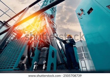 Industry operator use computer tablet for control rig platform for drilling wells for installing explosives on open pit mine coal, mineral, marble.