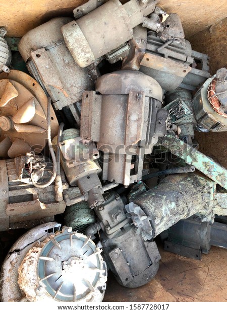 Industry recycle old\
motors. Machine technician separate and classification part of\
irons or steels and\
metals