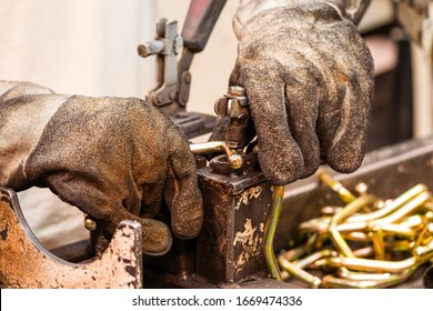 industry worker glove hand work protection labor automotive dirty cleaning repair worn automotive industry worker wearing used protection gloves industry worker glove hand work protection labor automo