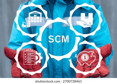 Industry worker using virtual touch screen sees the abbreviation SCM. SCM Supply Chain Management and business strategy concept.