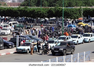 Inezgane, Morocco - October 1, 2022: Blue Taxi And Parking Cars In Inezgane City, Morocco. The Trafic In The Center Of Inezgane City.