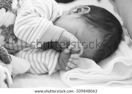 Similar – Newborn baby girl in hostpital bed sleeping