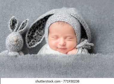 Infant Baby Boy Sleeping Under Blanket