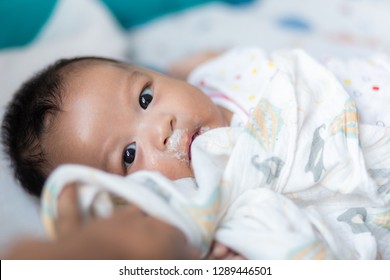 Infant Baby Boy Vomit After Eat Milk On Bed, Baby Puke Milk