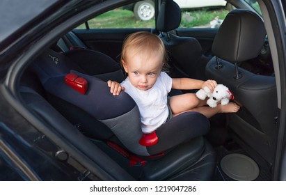 Infant Baby Girl In Car Seat. Closeup Photo