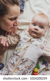 Infant Baby Little Kid Looks Camera Surprised Lying Bed Child Children Care Lonely Abuse. Emotional Baby Boy Scared Look Innocent Eyes. Happy Parenting Love Family Unity Nursing Parenthood Protection