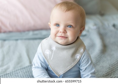 Infant Baby Posing In Bib