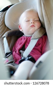 Infant Baby Sleeping Peacefully In A Car Seat