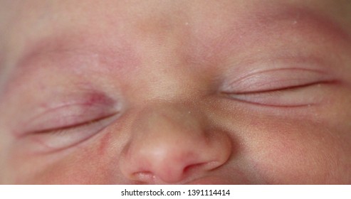 
Infant newborn baby with eyes closed