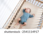 Infant Resting Quietly in Crib