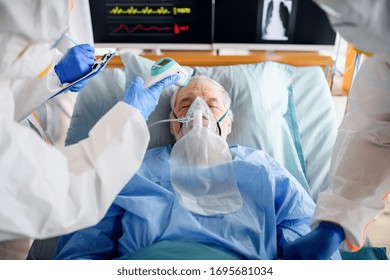 Infected Patient In Quarantine Lying In Bed In Hospital, Coronavirus Concept.