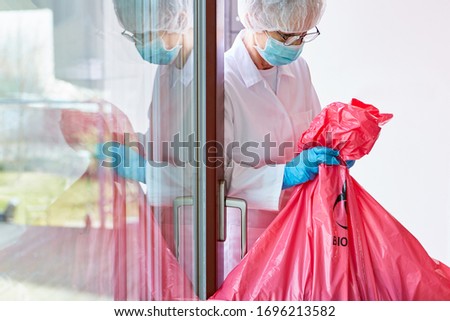 Infectious hazardous waste Disposal in hospital by cleaning staff with a mouthguard in the case of a coronavirus epidemic