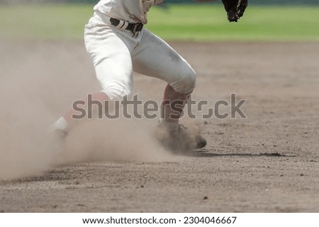 Infielder guarding third base during a baseball game