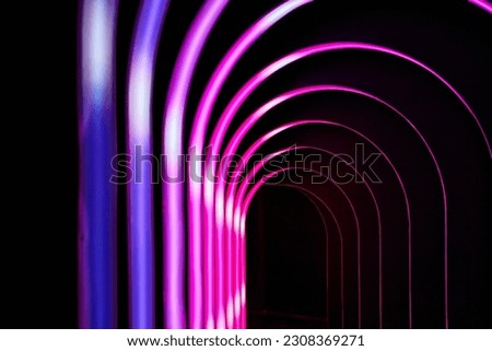 Infinite corridor asset with black background and hot pink and purple archways