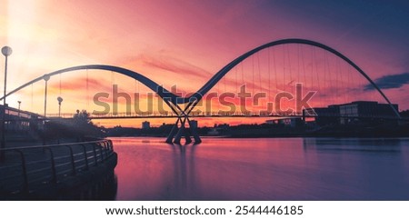 Infinity Bridge on dramatic sky at sunset in Stockton-on-Tees, UK.