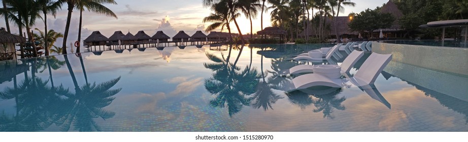 Infinity Pool With The Sunset At Bora Bora