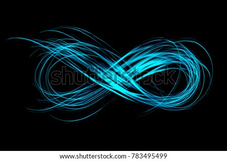 infinity sign created by blue neon freeze light on a black background