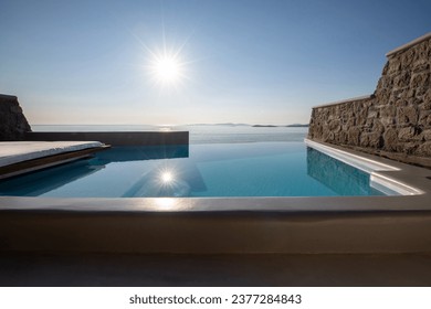 Infinity swimming pool in Mykonos, Greece - Powered by Shutterstock - Get 15% off with code: PIKWIZARD15