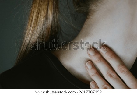 Inflamed lymph node on the neck of a woman with illness close-up. In most cases, inflammation in the lymph node area occurs precisely against the background of infection. High quality photo