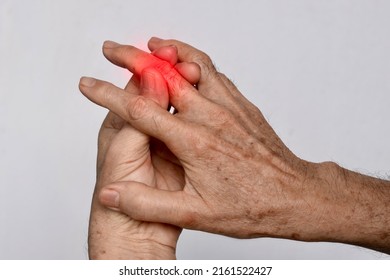 Inflammation Of Asian Old Man Middle Finger And Hand. Concept Of Arthritis Or Cellulitis.