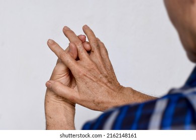 Inflammation Of Asian Old Man Middle Finger And Hand. Concept Of Arthritis And Finger Problem.