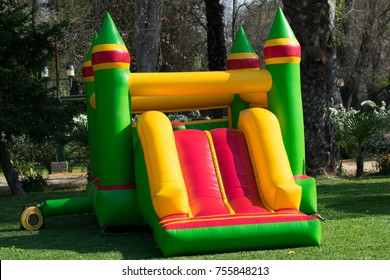 Inflatable Castle Game Green With Yellow In The Garden