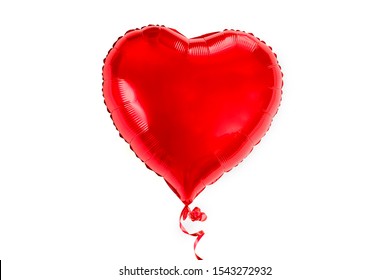 inflatable heart in red color isolated on white background Flat lay Top view Holiday card, Happy Valentine's day concept Love in air