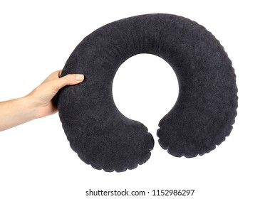 Inflatable neck pillow with hand for comfort travel, isolated on white background.