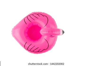 Inflatable pink flamingo isolated on white background. Summer beach composition. Flat lay, top view.