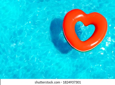 Inflatable Red Heart Buoy Swim In The Swimming Pool View From Above