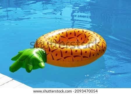 Inflatable ring in swimming pool