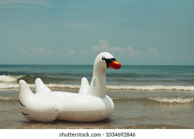 Inflatable Swan On The Beach