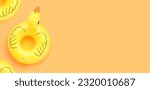 Inflatable of yellow duck on yellow background. Summer background concept