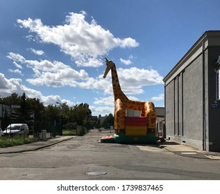 Inflated yellow and red giraffe